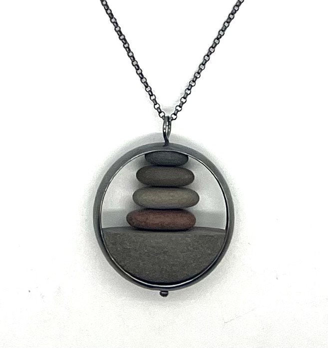 Stack of Rocks in Silver Circle