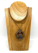 Load image into Gallery viewer, Rocks stacked in wood circle necklace
