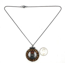 Load image into Gallery viewer, Rocks stacked in wood circle necklace
